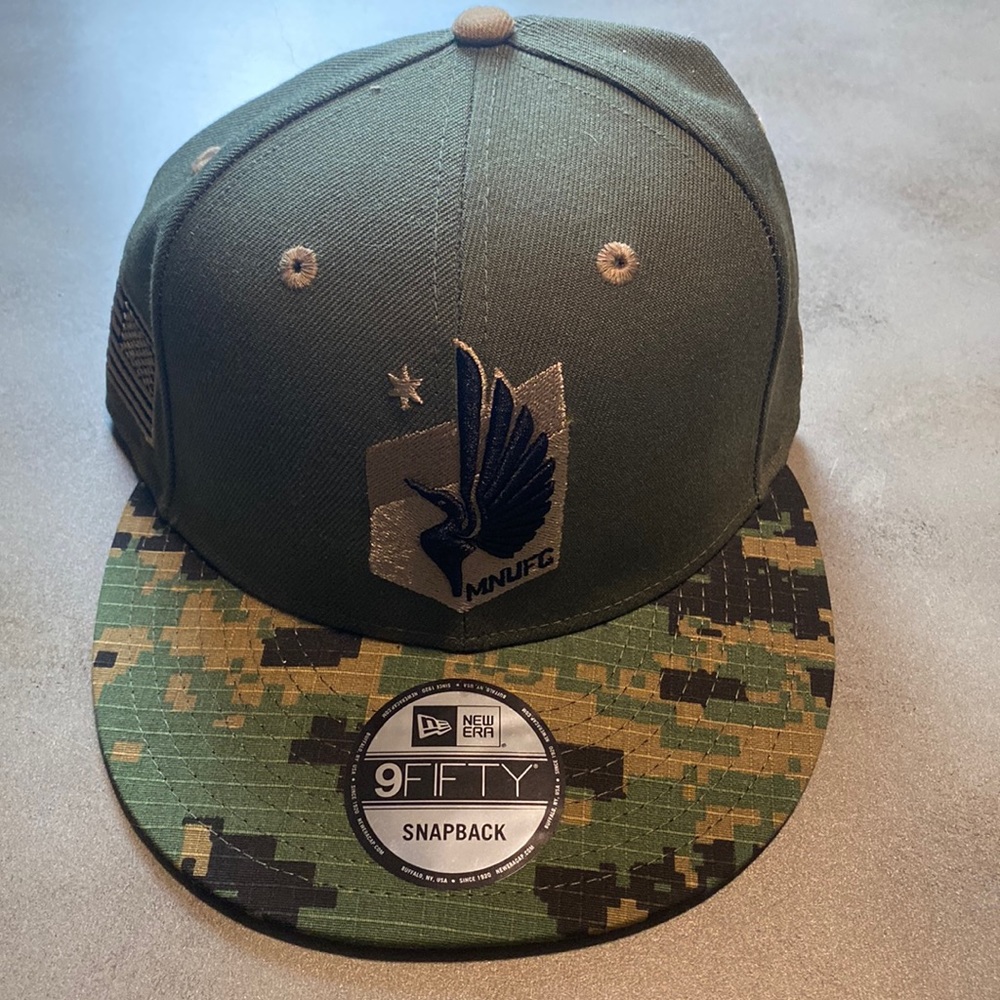 Camo New Era Minnesota United FC SnapBack Adjustable Hat. 9Fifty